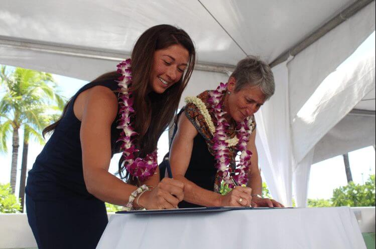 CoalitionWILD Director, Crista Valentino, signing an MOU with U.S. Secretary of the Interior, Sally Jewell