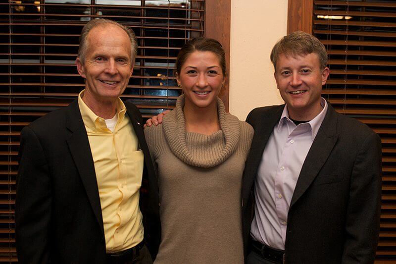 Crista Valentino, bookended by her two early - career mentors: WILD president Vance Martin, and previous Executive Director of the Murie Center, Jon Mobeck