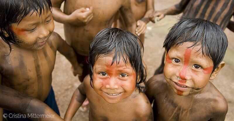 Village children in rain (Kayapó, Pará, Brazil, March 2006)
